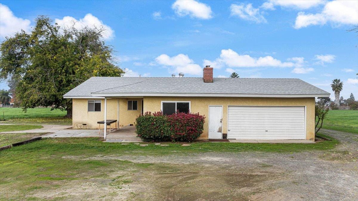 2679 Lobo Avenue Merced, CA 95348 - Photo 65 of 88 a front view of a house with garden