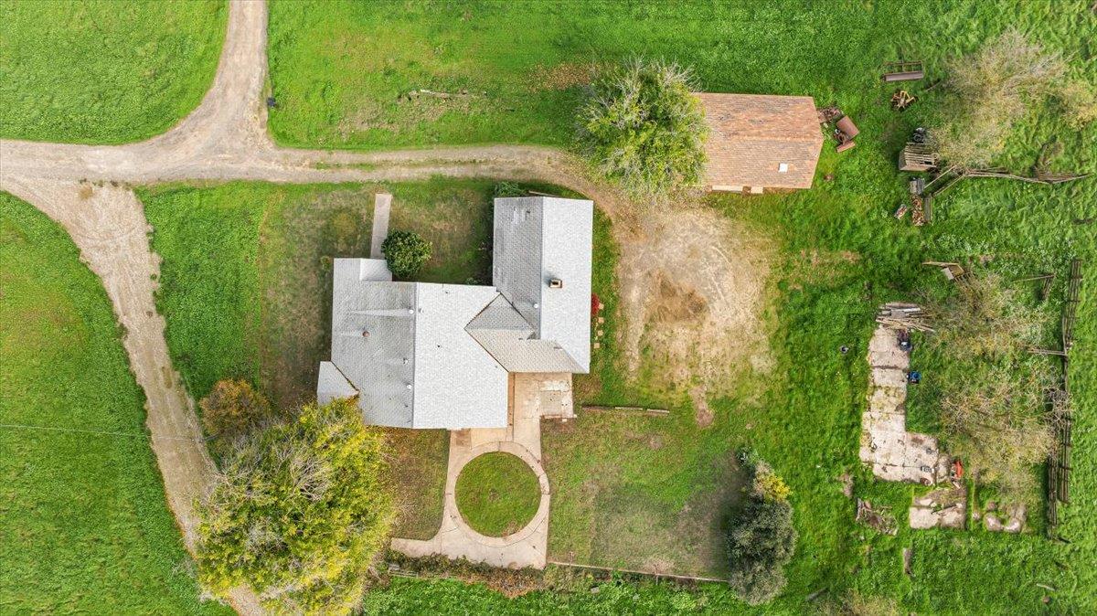 2679 Lobo Avenue Merced, CA 95348 - Photo 73 of 88 an aerial view of residential house with outdoor space and trees all around