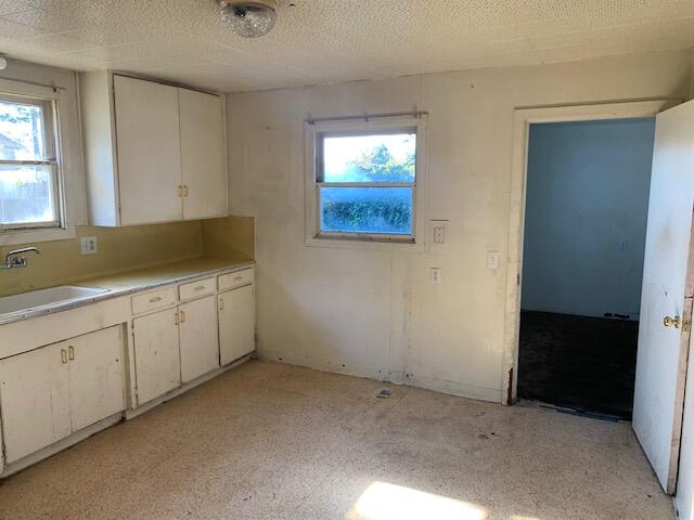 4040 Cedar Street Cutten, CA 95503 - Photo 10 of 21 a view of a kitchen with white cabinets