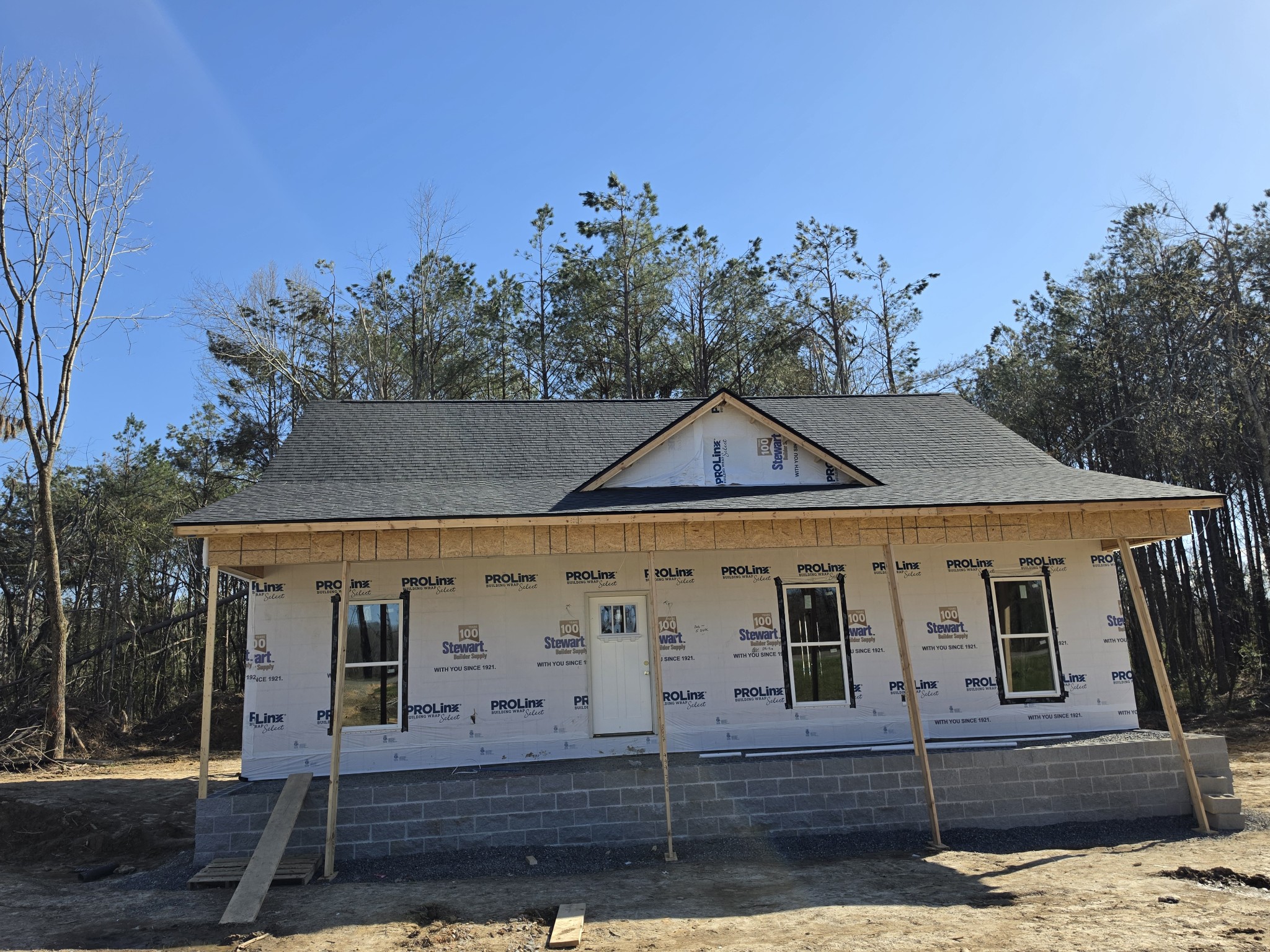 10000 North Tidwell Road Bon Aqua, TN 37025 - Photo 2 of 3 a front view of a house with a yard