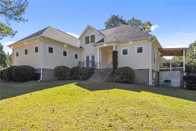 a view of a house with a swimming pool