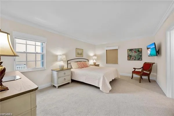 a bathroom with a double vanity sink mirror and toilet