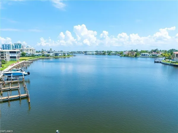 a view of a lake with houses
