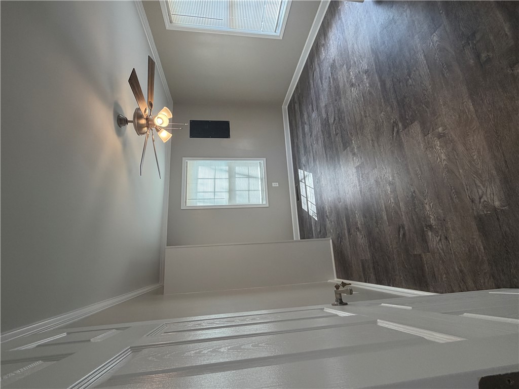 221 Richey Street Anderson, SC 29625 - Photo 9 of 22 This interior space features hardwood flooring and a functional ceiling fan.