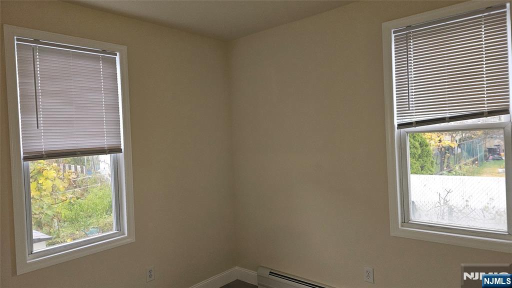 164 Humboldt Street East Rutherford, NJ 07073 - Photo 11 of 12 a view of an empty room and window