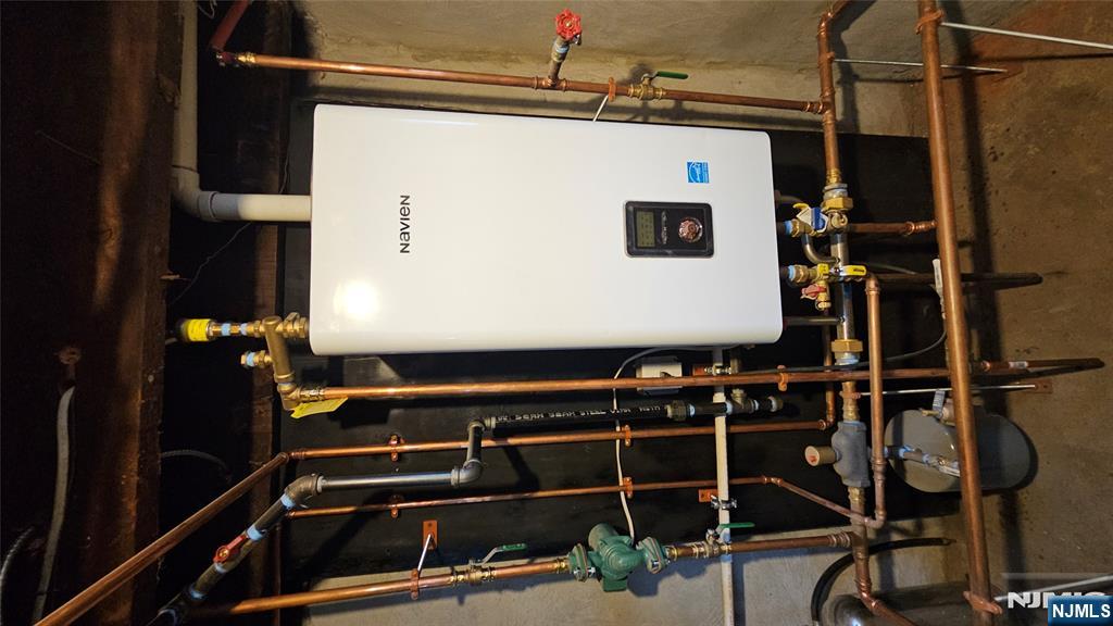 164 Humboldt Street East Rutherford, NJ 07073 - Photo 6 of 12 a room with gym equipment