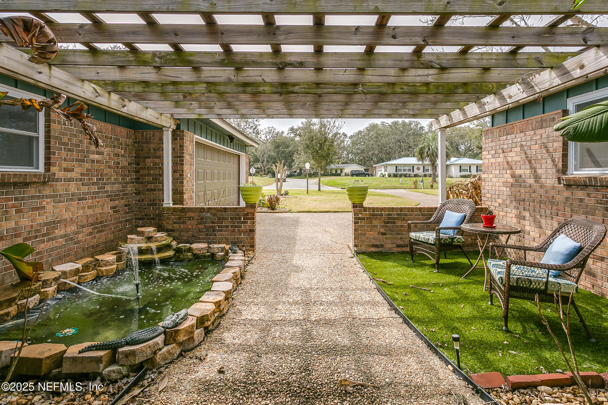 6433 River Point Drive Fleming Island, FL 32003 - Photo 4 of 76 a view of a swimming pool with a patio