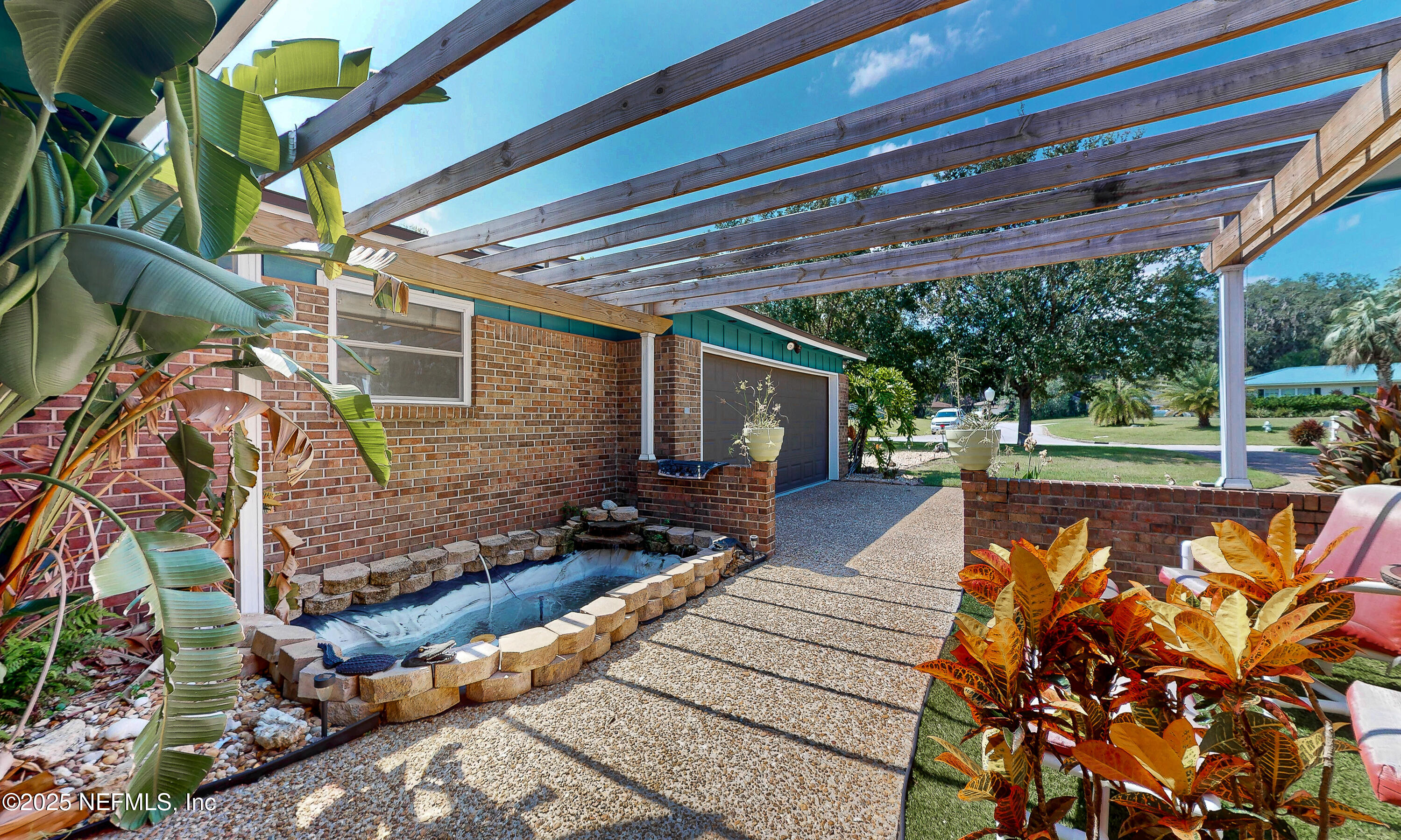 6433 River Point Drive Fleming Island, FL 32003 - Photo 5 of 76 Ext Front Courtyard