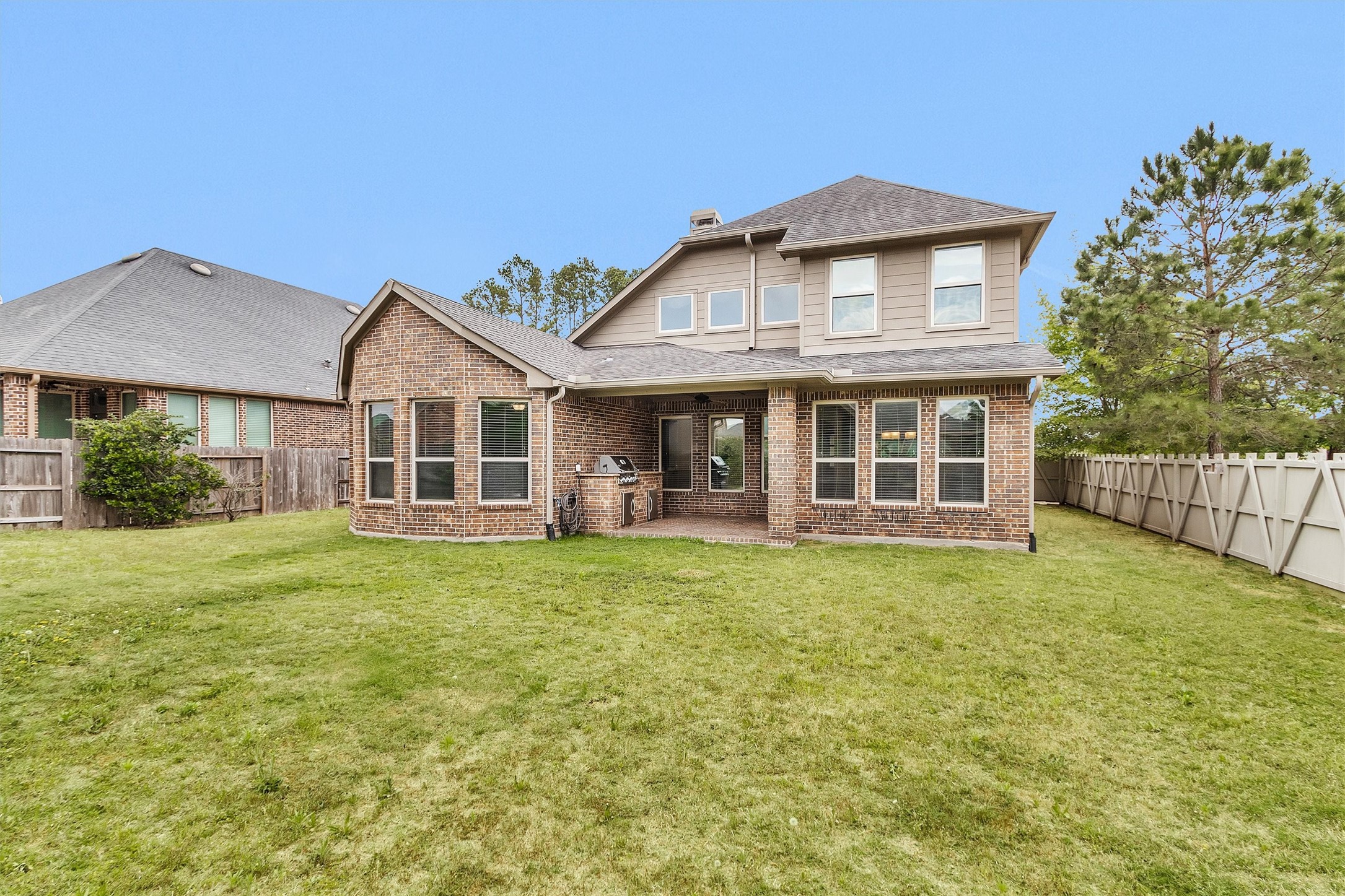 17203 Prairie Falcon Lane Conroe, TX 77385 - Photo 2 of 30 Large backyard Big enough for a pool Comes with outdoor kitchen