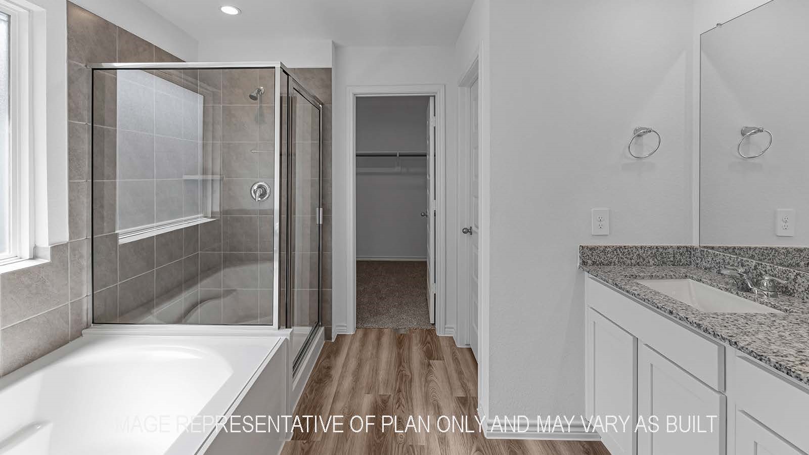 530 Hunters Grove Lane Beaumont, TX 77713 - Photo 15 of 24 a bathroom with a granite countertop tub sink and shower