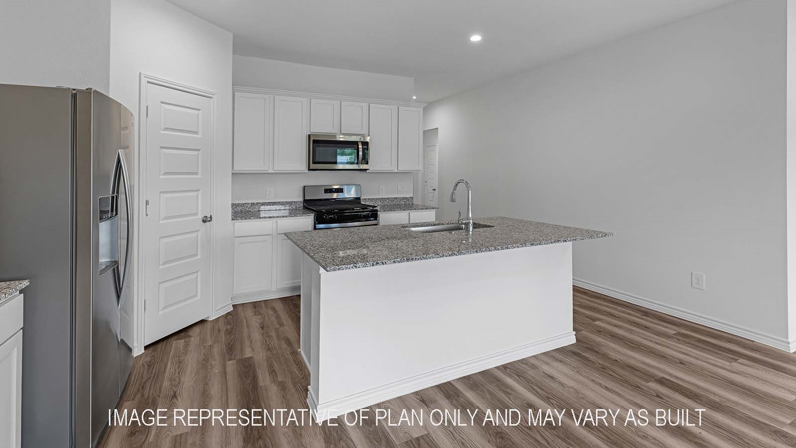 530 Hunters Grove Lane Beaumont, TX 77713 - Photo 6 of 24 a kitchen with stainless steel appliances a sink a stove a refrigerator and cabinets