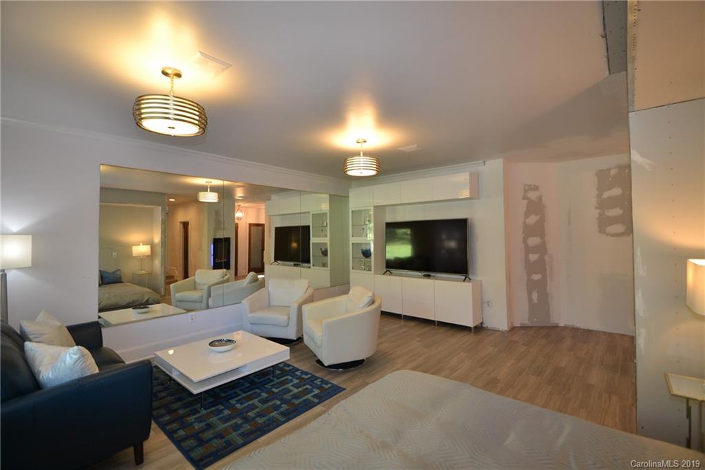 3431 Lee Moore Road Maiden, NC 28650 - Photo 15 of 44 a living room with furniture and a flat screen tv