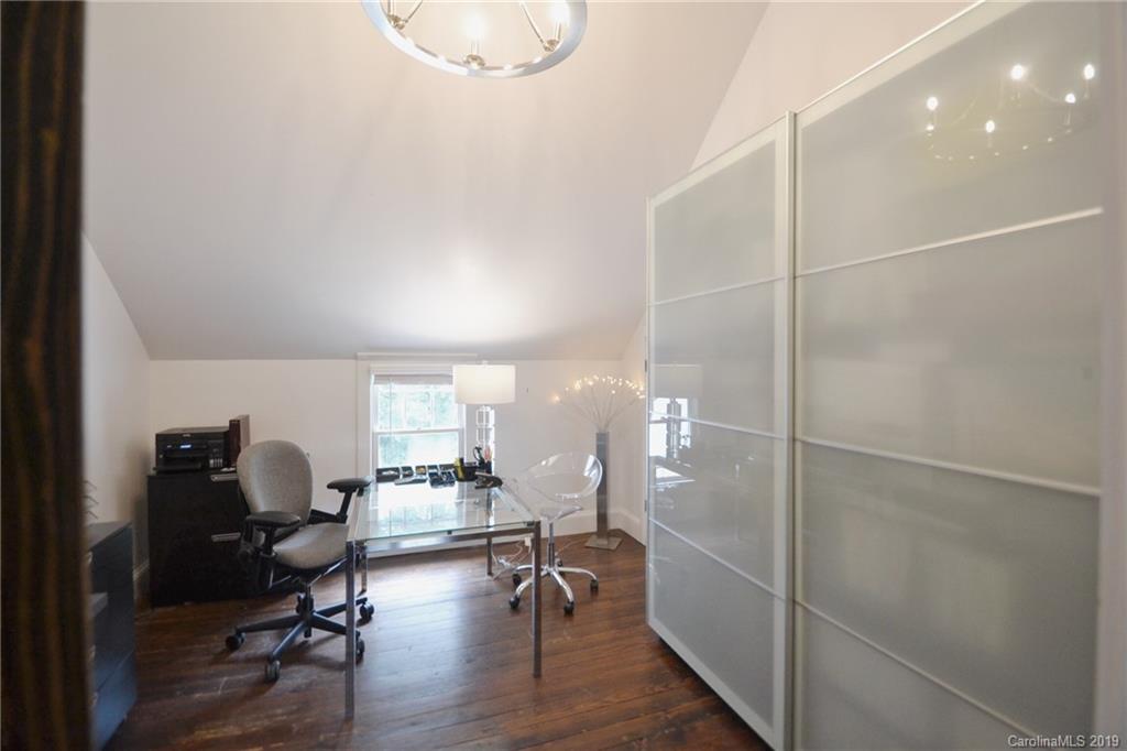 3431 Lee Moore Road Maiden, NC 28650 - Photo 26 of 44 a room with wooden floor and furniture