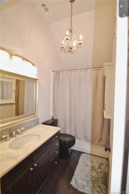 3431 Lee Moore Road Maiden, NC 28650 - Photo 30 of 44 a bathroom with a double vanity sink and a mirror