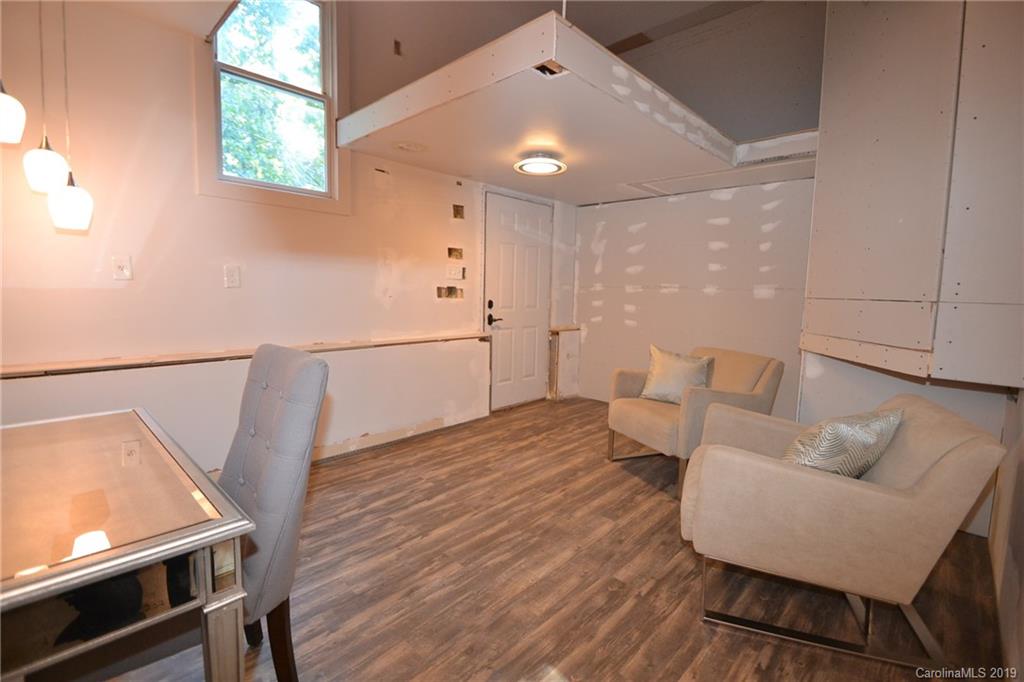 3431 Lee Moore Road Maiden, NC 28650 - Photo 34 of 44 a living room with furniture and a wooden floor