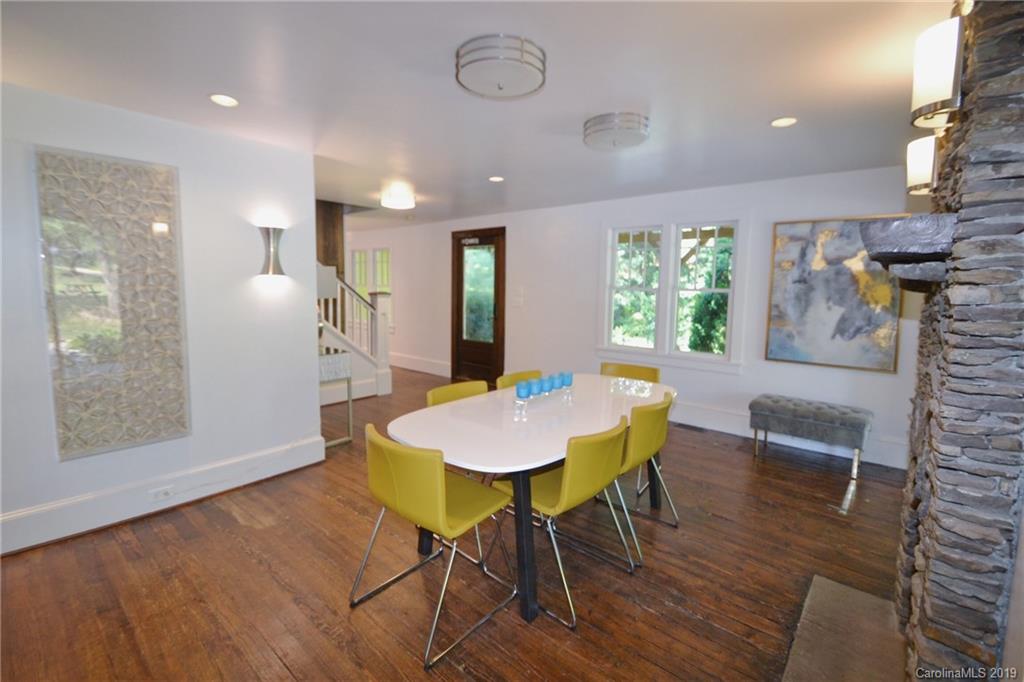 3431 Lee Moore Road Maiden, NC 28650 - Photo 5 of 44 a view of a dining room with furniture and wooden floor