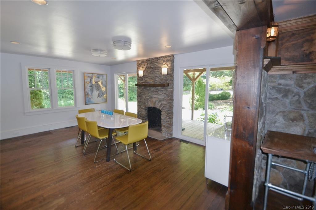 3431 Lee Moore Road Maiden, NC 28650 - Photo 6 of 44 a view of a dining room with furniture window and wooden floor