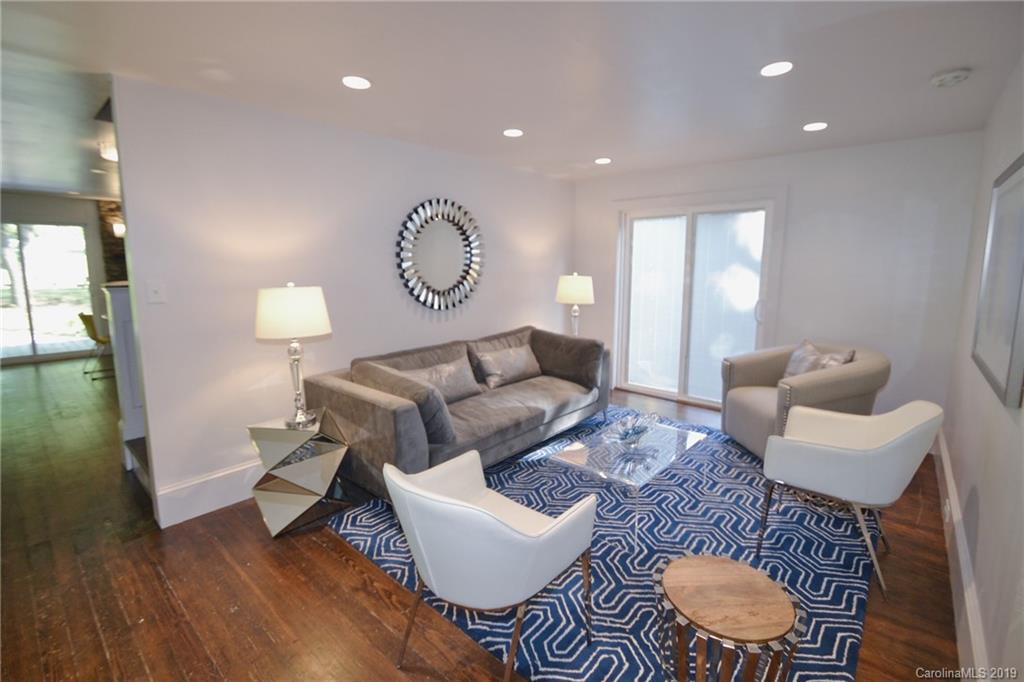 3431 Lee Moore Road Maiden, NC 28650 - Photo 7 of 44 a living room with furniture and a wooden floor