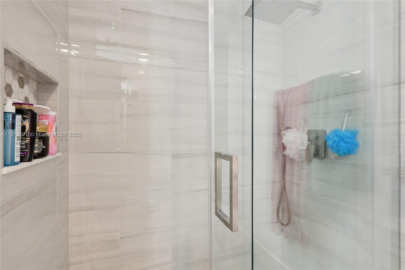 14804 Southwest 155th Place Miami, FL 33196 - Photo 15 of 35 a bathroom with a shower