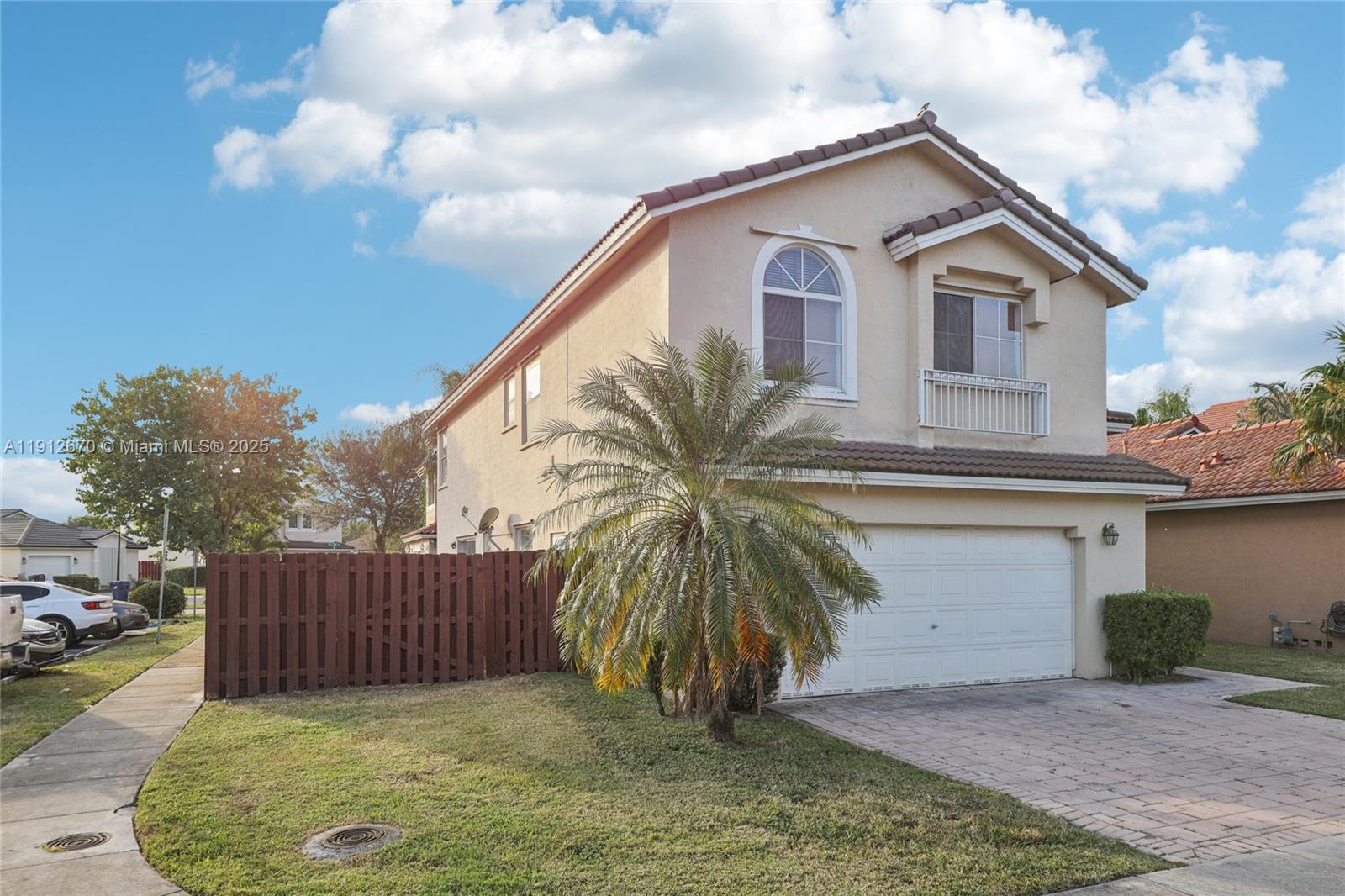 14804 Southwest 155th Place Miami, FL 33196 - Photo 3 of 35 a view of a house with a yard