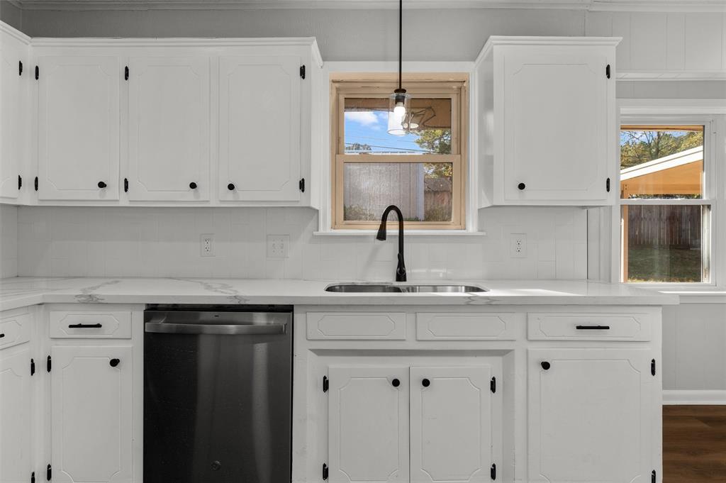 809 Princesa Drive Haughton, LA 71037 - Photo 9 of 17 a kitchen with granite countertop white cabinets and a white wooden cabinets