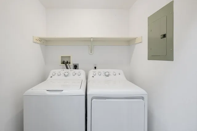 a utility room with dryer and washer