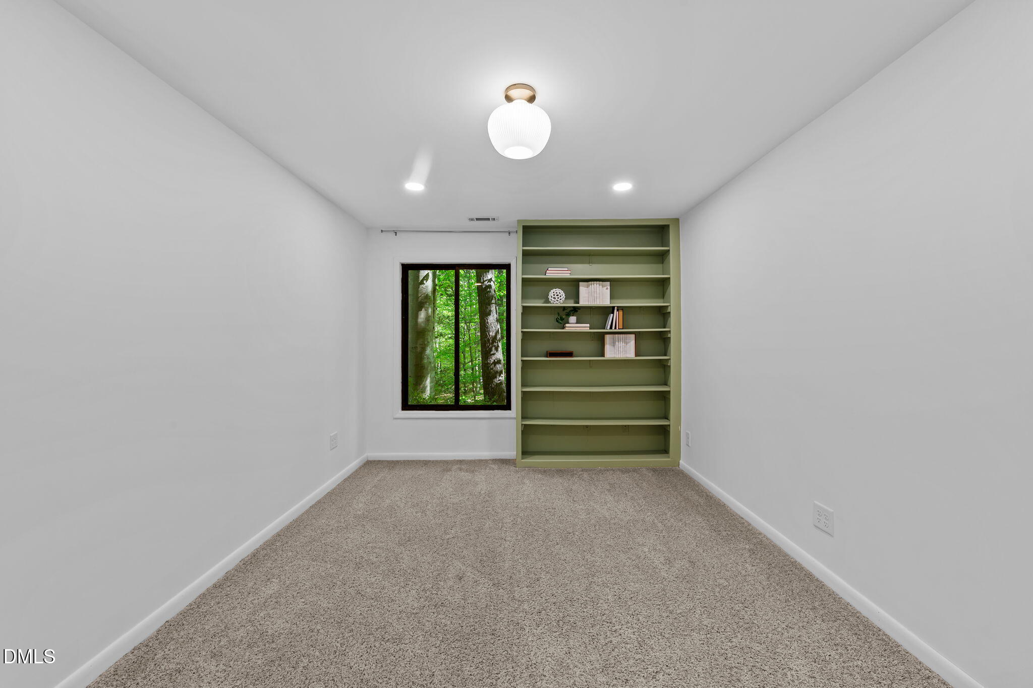 105 Barcliff Terrace Cary, NC 27518 - Photo 28 of 47 wooden floor in an empty room with a window