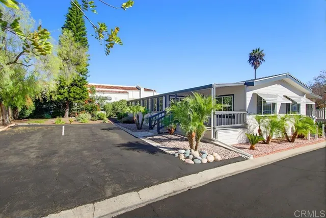 a view of a balcony with furniture
