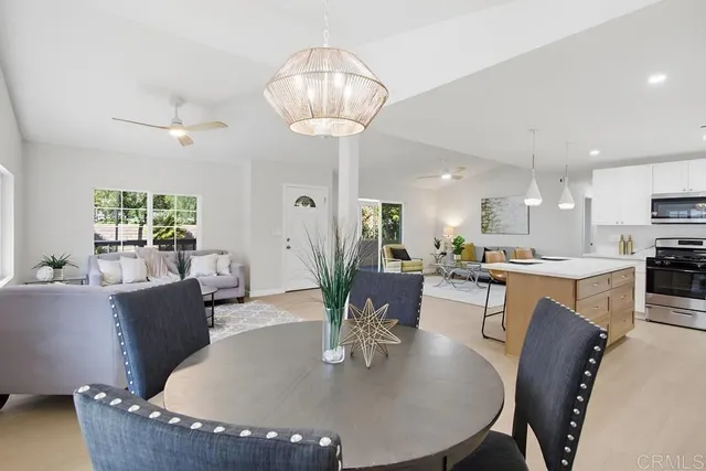 a view of a dining room with furniture