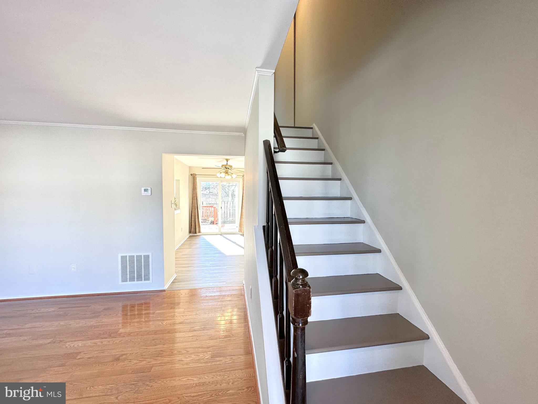 402 Carousel Court Gaithersburg, MD 20877 - Photo 2 of 29 a view of entryway and hall with wooden floor