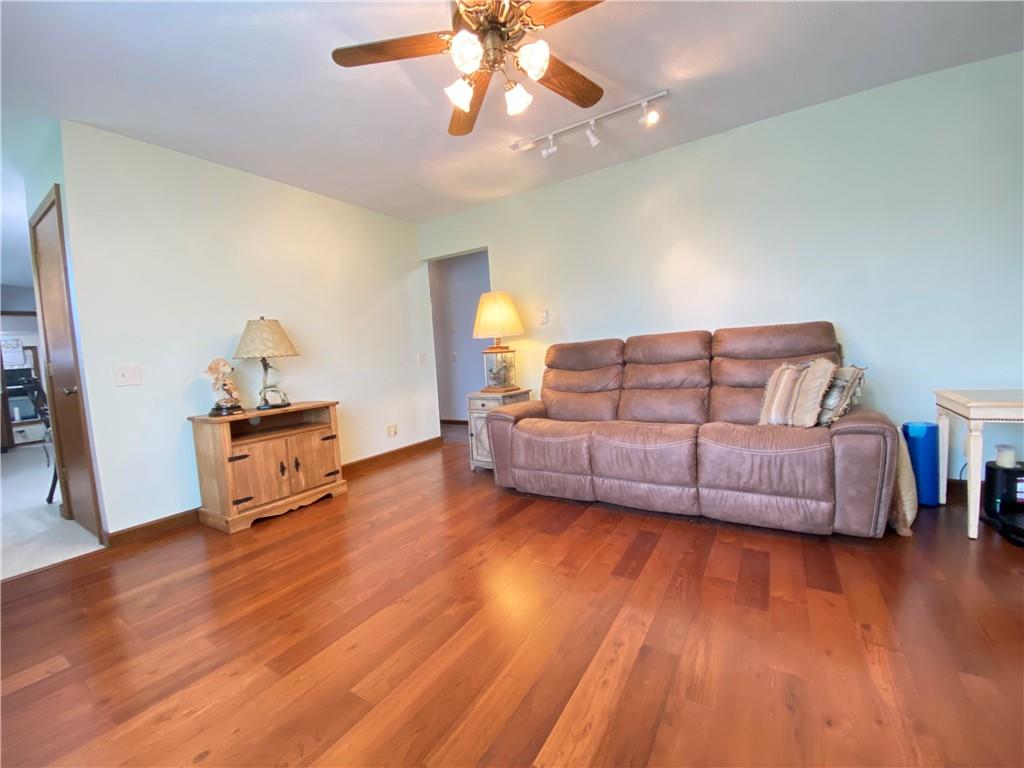 240 Hamburg Road Greenville, PA 16125 - Photo 21 of 46 a bedroom with a bed and wooden floor