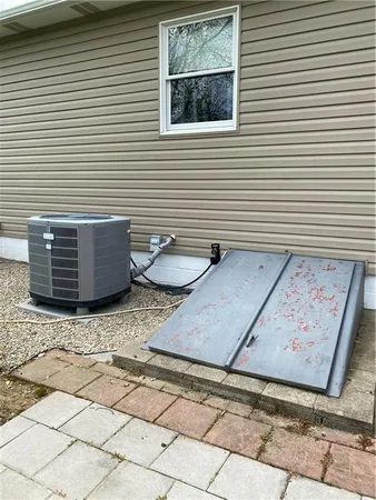 a view of a terrace with window and furniture