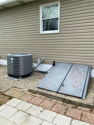 a view of a terrace with window and furniture