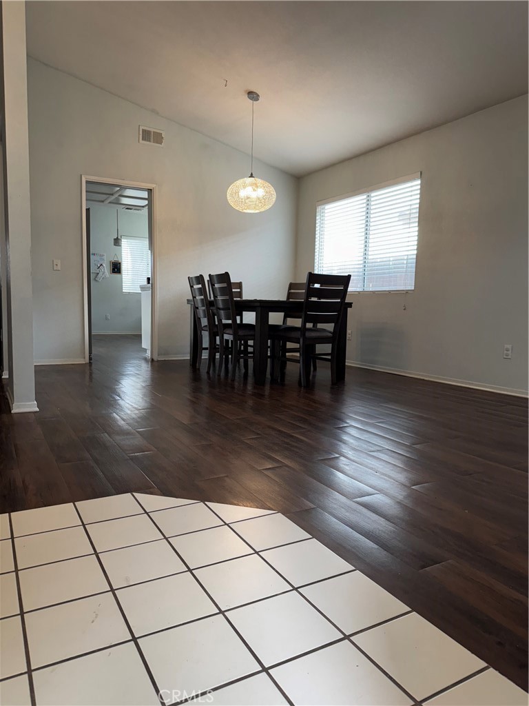 44063 Lately Circle Hemet, CA 92544 - Photo 14 of 75 a view of dining room with furniture and wooden floor