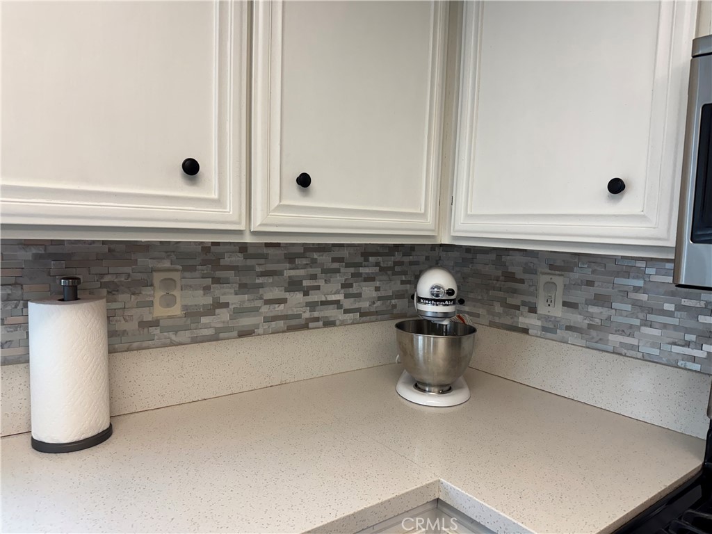 44063 Lately Circle Hemet, CA 92544 - Photo 26 of 75 a kitchen with a sink and a stove