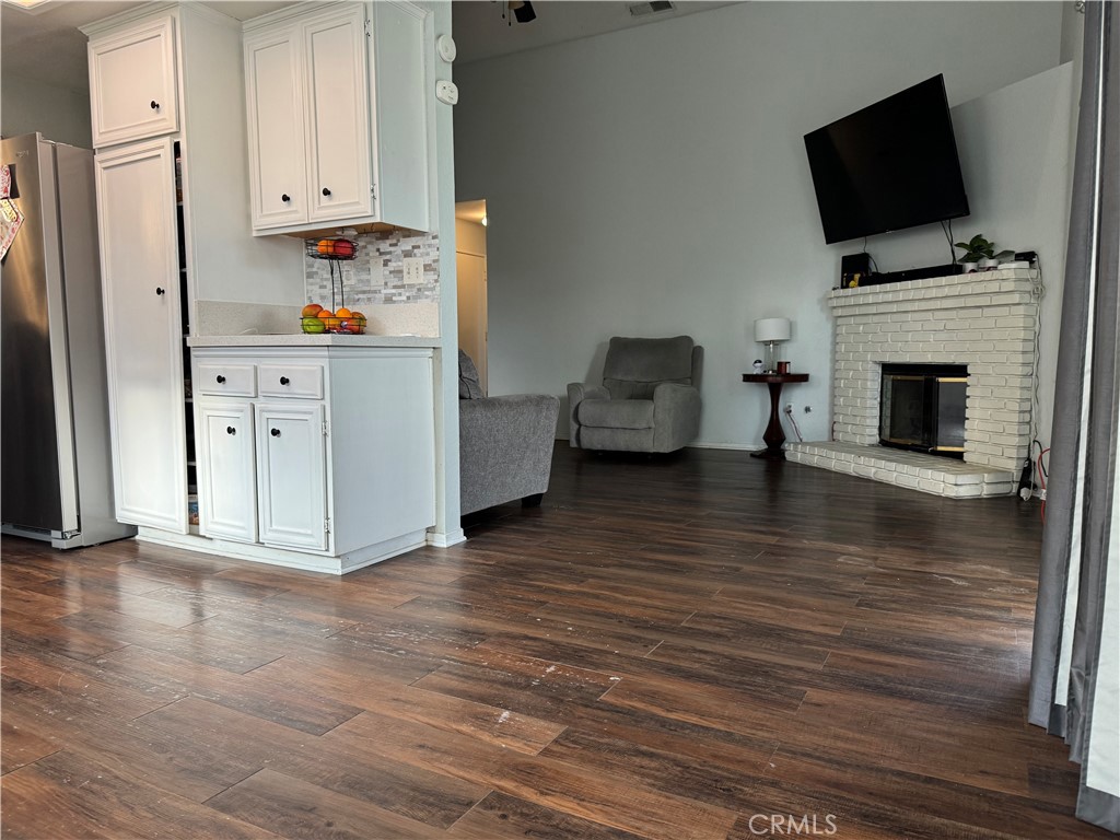 44063 Lately Circle Hemet, CA 92544 - Photo 28 of 75 a living room with furniture and a flat screen tv