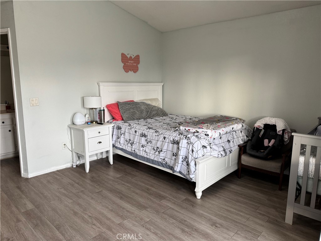 44063 Lately Circle Hemet, CA 92544 - Photo 32 of 75 a bedroom with a bed and a closet