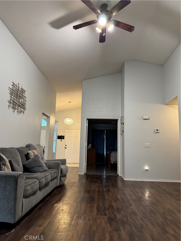 44063 Lately Circle Hemet, CA 92544 - Photo 42 of 75 a living room with furniture and a chandelier