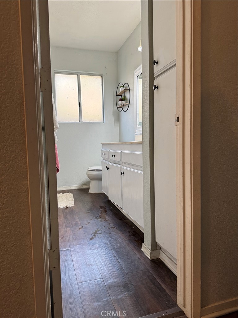 44063 Lately Circle Hemet, CA 92544 - Photo 57 of 75 a bathroom with a toilet sink and mirror