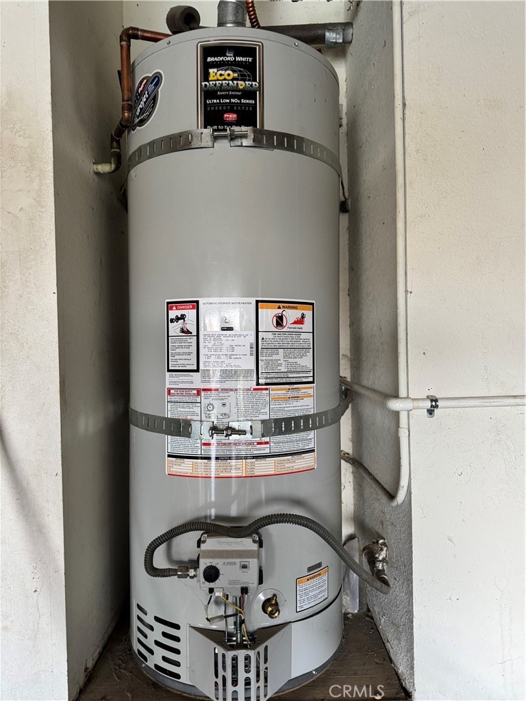 44063 Lately Circle Hemet, CA 92544 - Photo 60 of 75 a room with water heater and stainless steel appliances