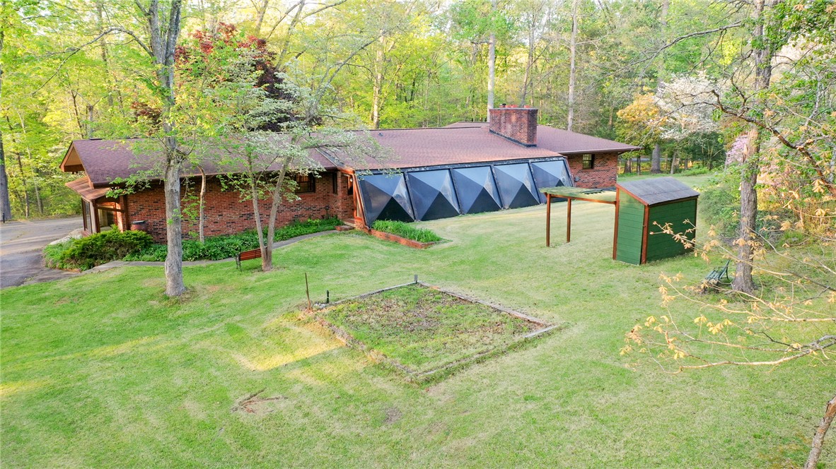 139 Todds Creek Road Central, SC 29630 - Photo 29 of 45 This charming brick home offers a private yard and an integrated sunroom for year-round enjoyment.