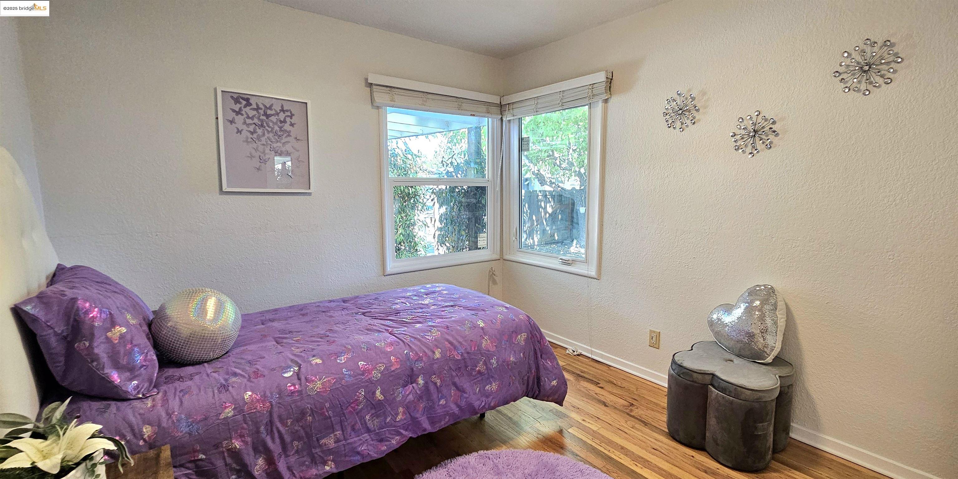 3195 Willow Pass Road Concord, CA 94519 - Photo 20 of 30 a bedroom with a bed and a window