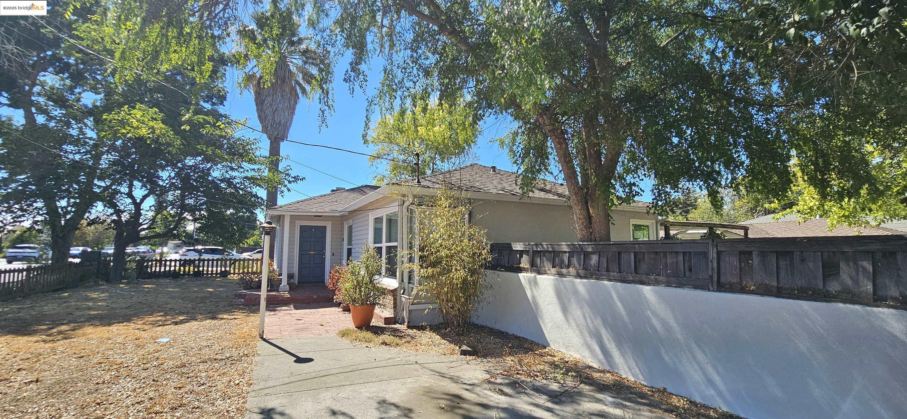 3195 Willow Pass Road Concord, CA 94519 - Photo 2 of 30 a view of a house with a yard