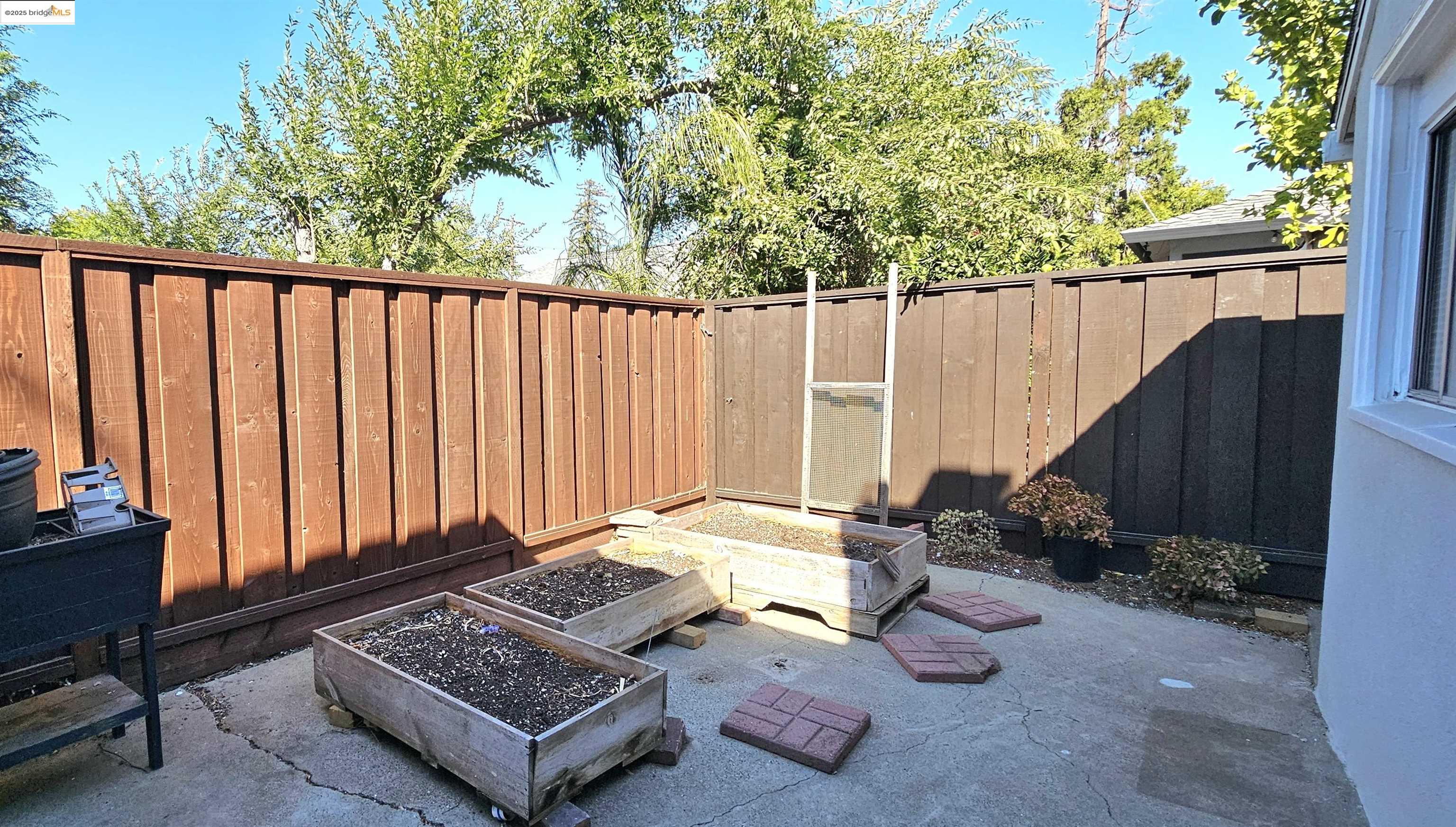 3195 Willow Pass Road Concord, CA 94519 - Photo 25 of 30 a view of backyard with a patio and wooden fence