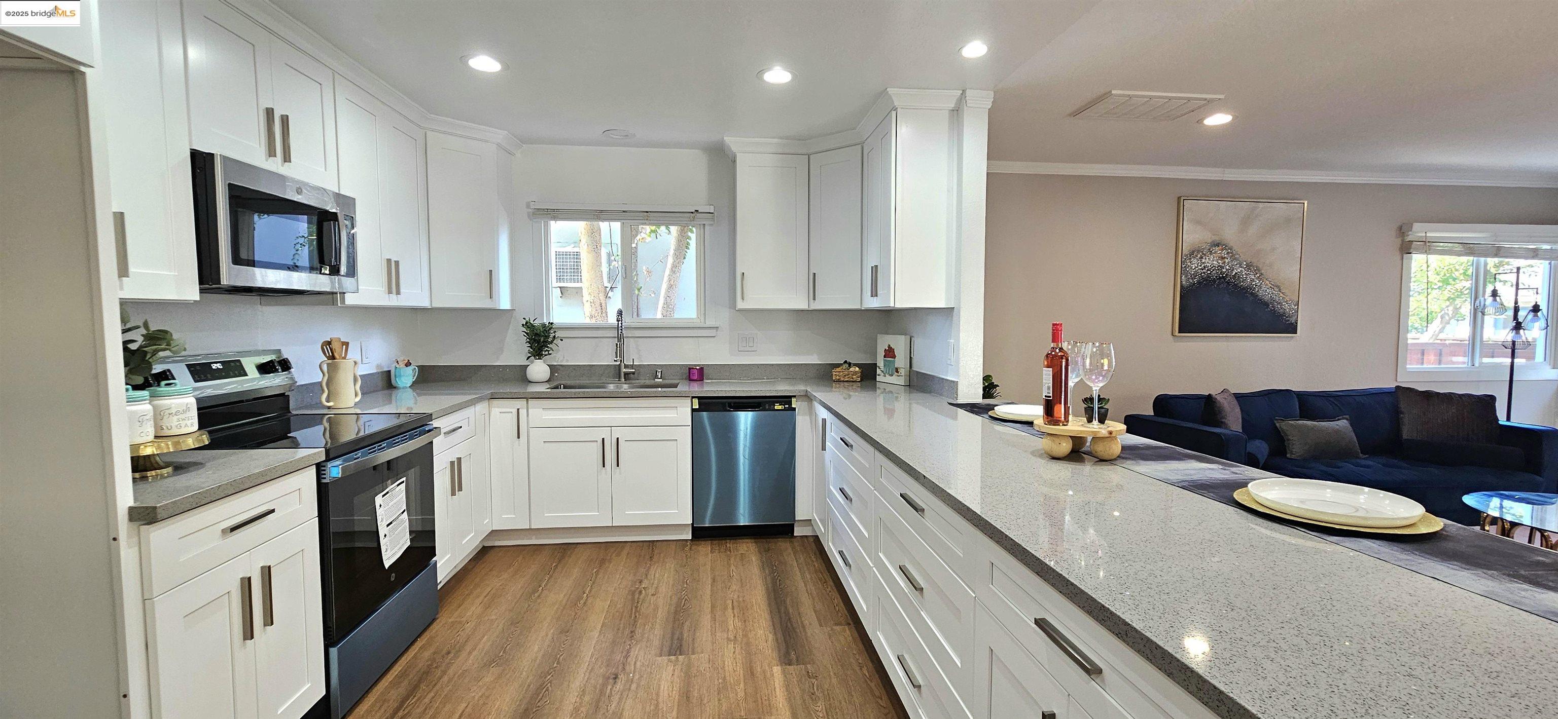 3195 Willow Pass Road Concord, CA 94519 - Photo 8 of 30 a kitchen with granite countertop lots of counter top space