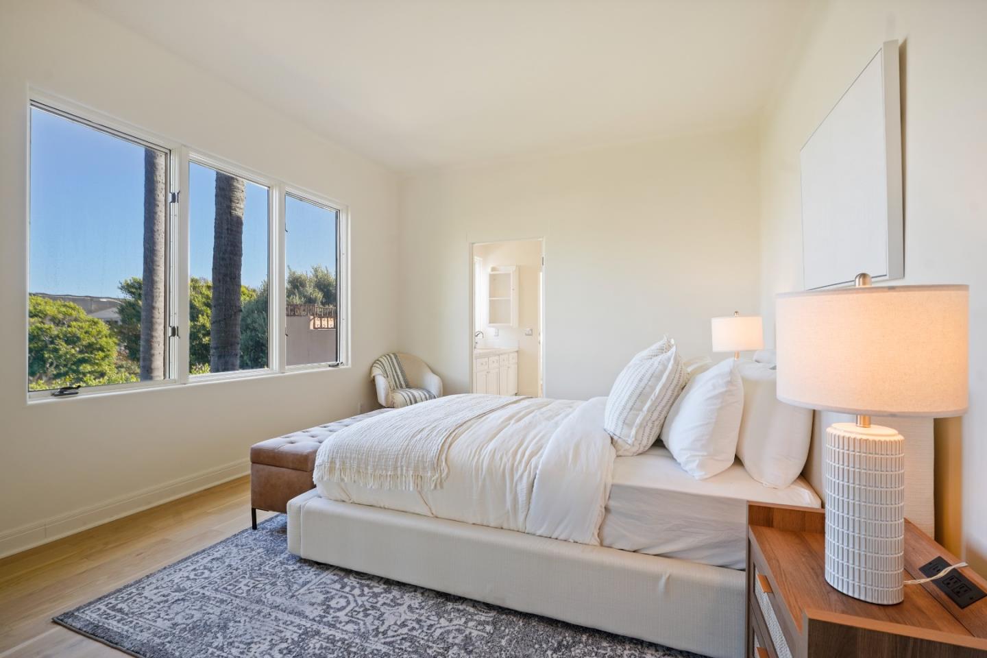 23349 Malibu Colony Road Malibu, CA 90265 - Photo 28 of 43 a bedroom with a bed and window