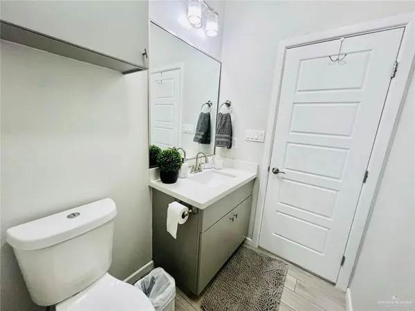 a bathroom with a sink toilet and tub