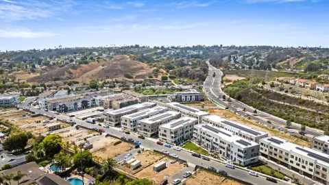 an aerial view of residential building and street