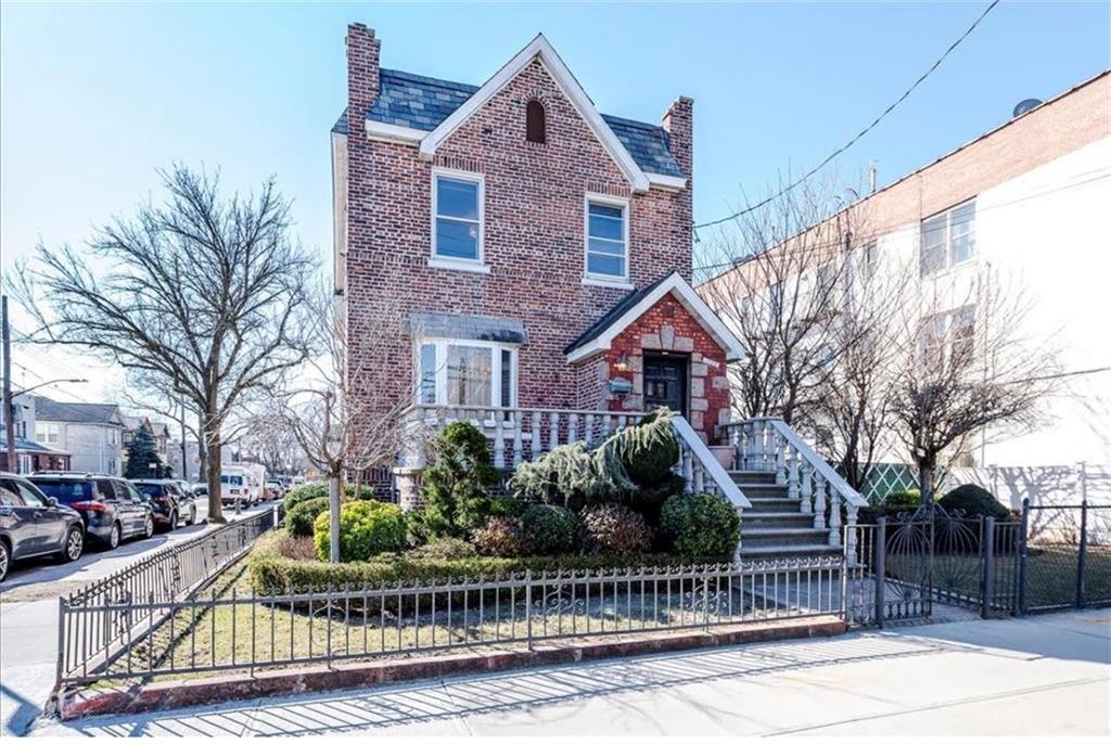 1722 Ave V Brooklyn, NY 11229 - Photo 3 of 28 a front view of a house with a yard