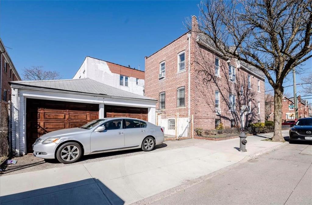 1722 Ave V Brooklyn, NY 11229 - Photo 28 of 28 a car parked in front of a building